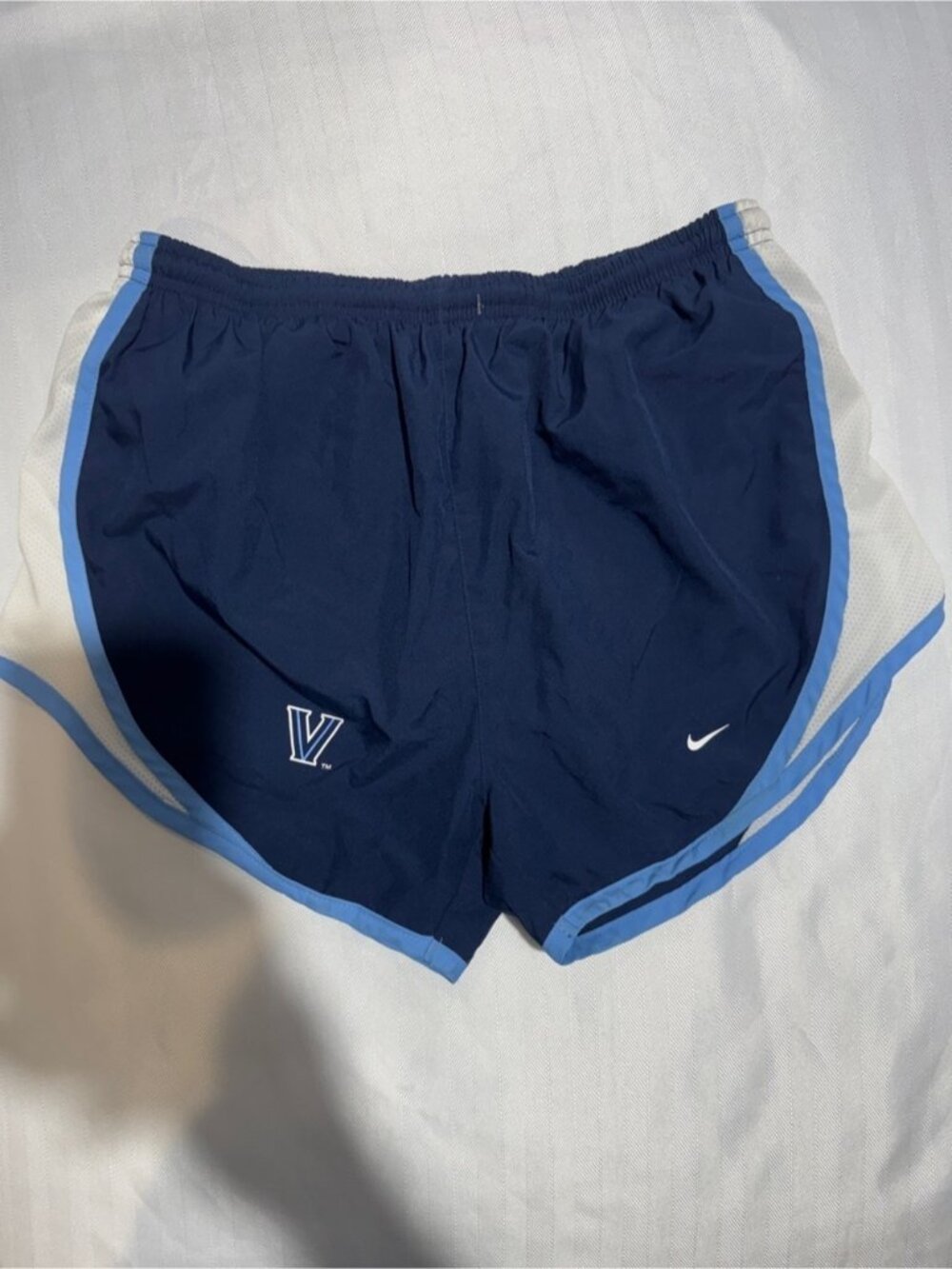 Nike Women's Navy Shorts with Light Blue Trim